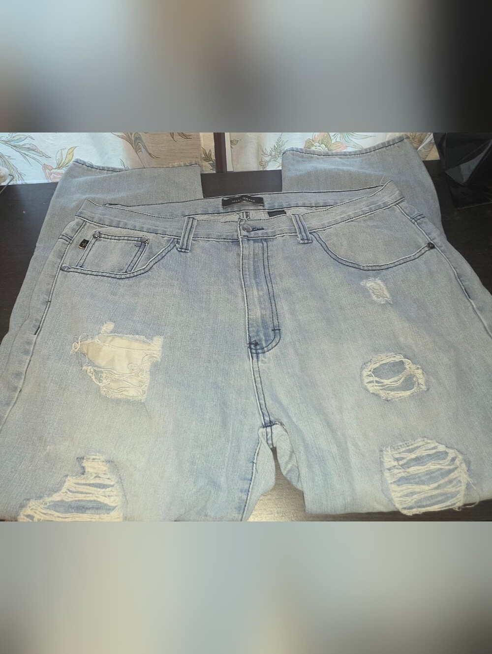 Relaxed Light Blue Distressed Men’s Jeans